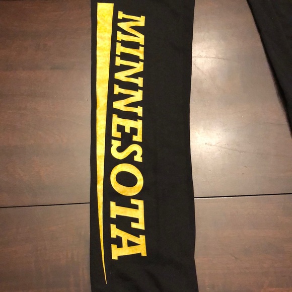 Gold medal leggings with Minnesota on leg. - Picture 2 of 4
